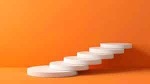 White steps on an orange background.
